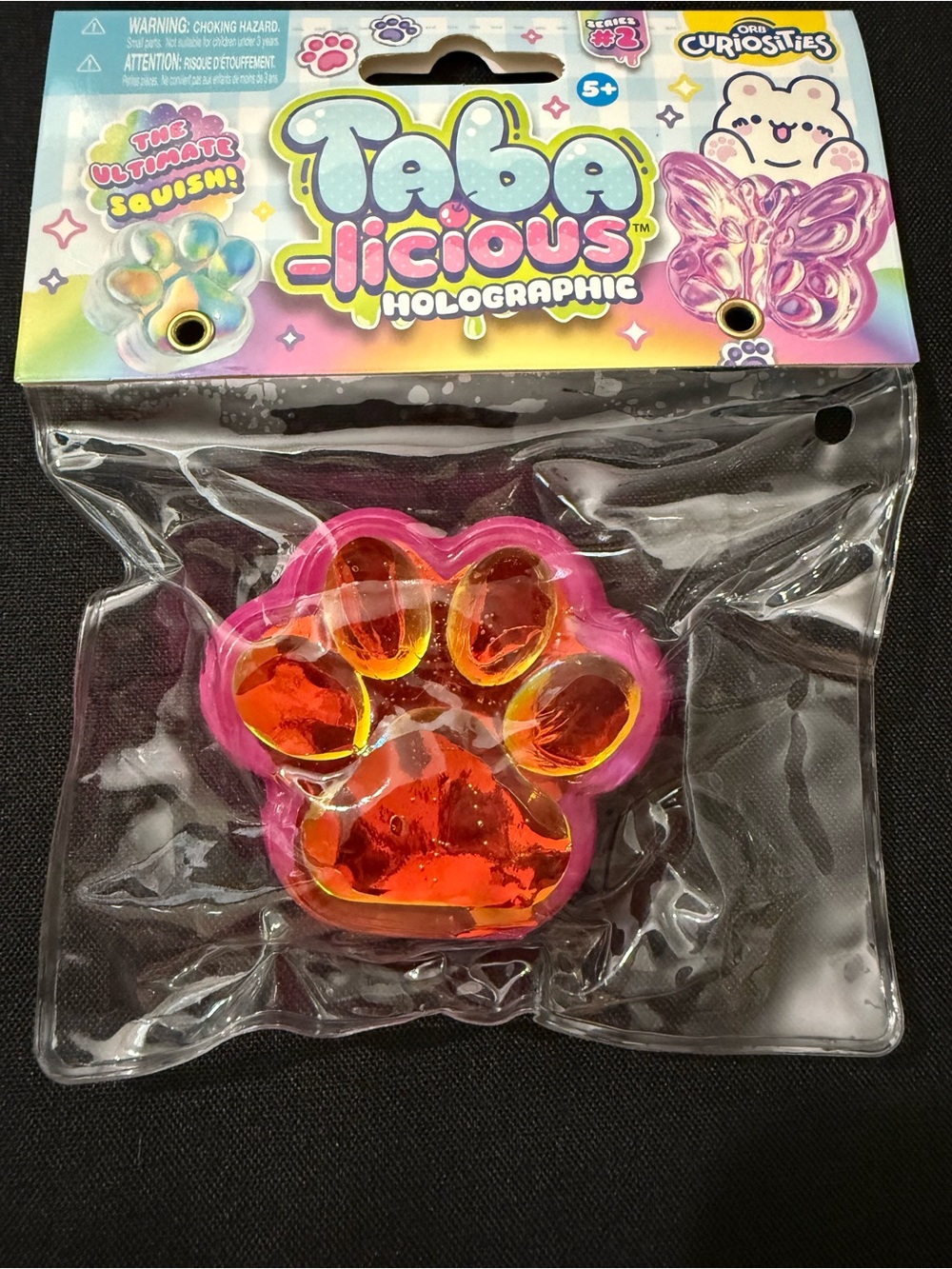Taba-licious Holographic Paw Squish Toy - Pink with Orange Center